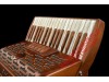 Paolo Soprani Folk 34 key 96 bass 3 voice wood accordion.  Midi expansion available.